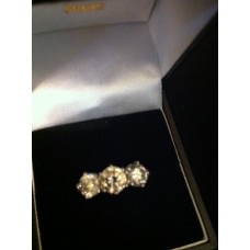 white gold three stone diamond ring